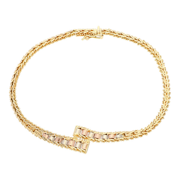 Pulsera eslabón boleado en oro tres tonos 14 kilates.