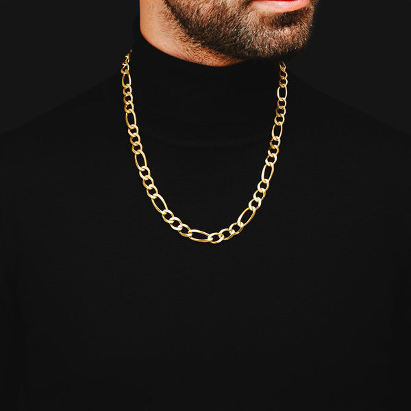 Collar de tres eslabones por uno en oro amarillo 14 kilates.