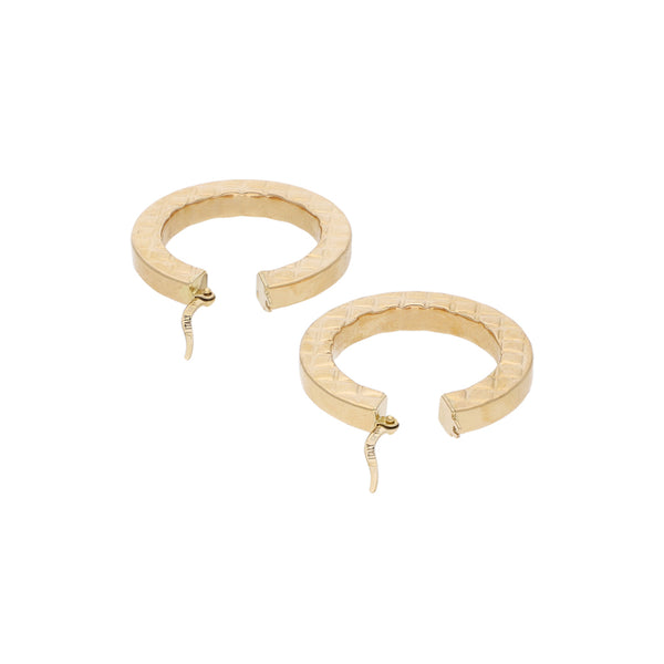 Arracadas huecas en oro amarillo 14 kilates.