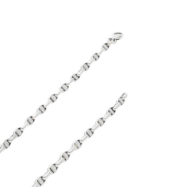 Collar eslabón nudo marino cruzado en oro blanco 14 kilates.