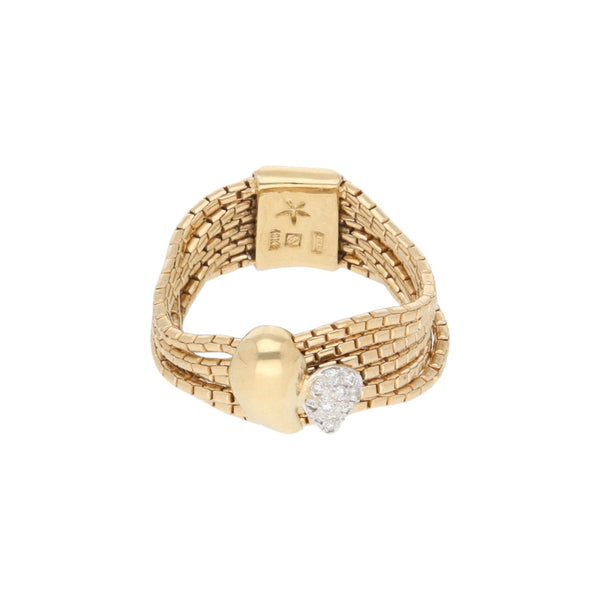 Anillo diseño especial con diamantes firma H. Stern en oro amarillo 18 kilates.