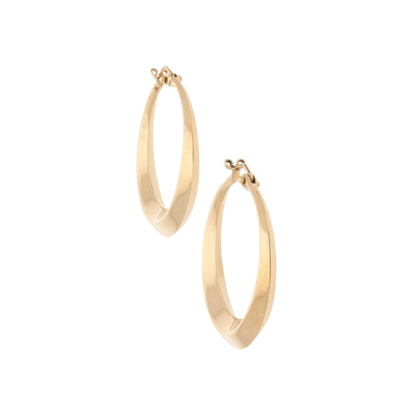 Arracadas huecas en oro amarillo 14 kilates.