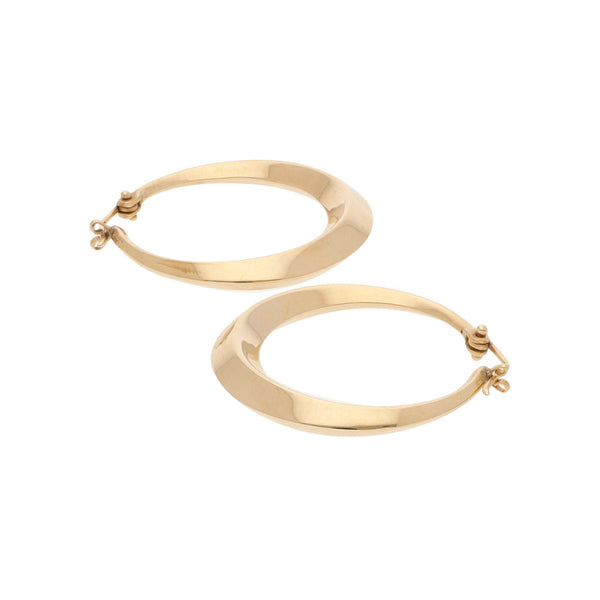 Arracadas huecas en oro amarillo 14 kilates.