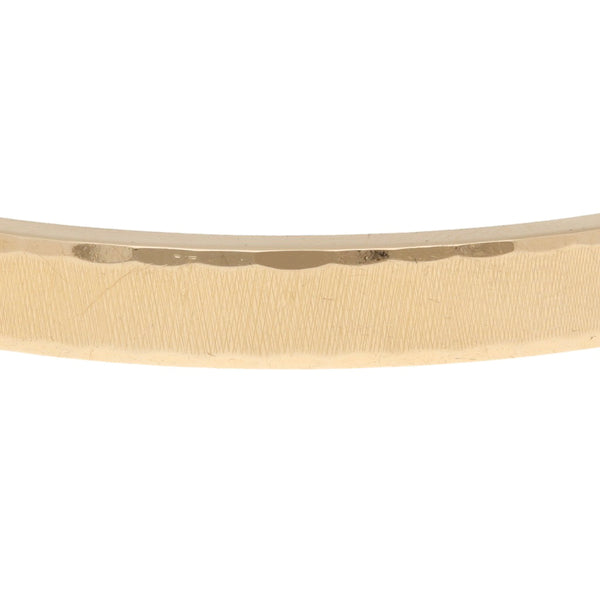 Pulsera de arillo facetada en oro amarillo 18 kilates.
