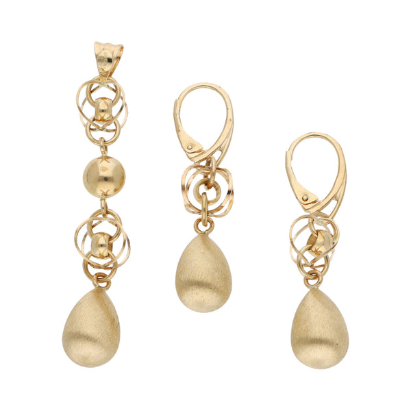 Juego de dije y aretes diseño especial en oro amarillo 14 kilates.