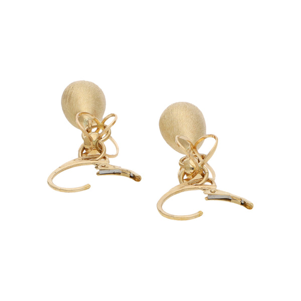 Juego de dije y aretes diseño especial en oro amarillo 14 kilates.