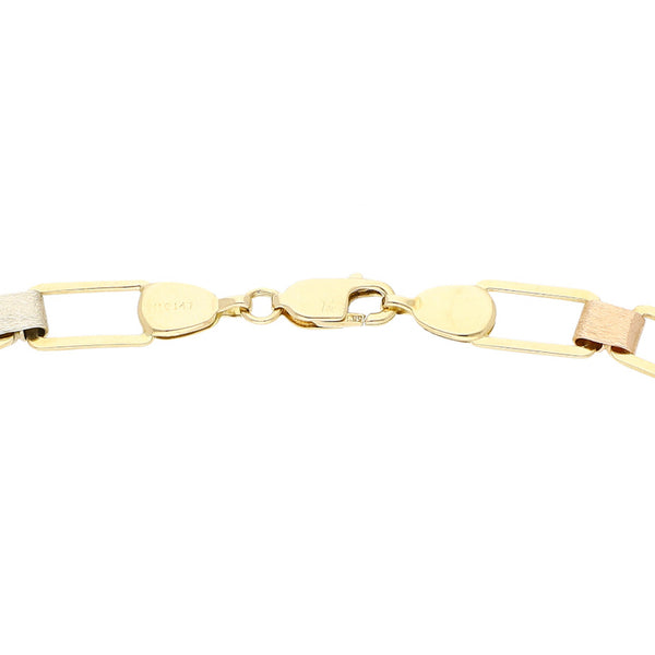 Pulsera eslabón articulado en oro tres tonos 14 kilates.