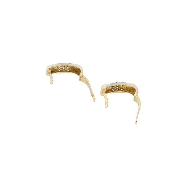 Aretes estilizados con circonias en oro amarillo 14 kilates.