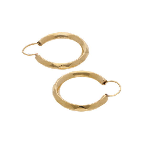 Arracadas facetadas en oro amarillo 18 kilates.
