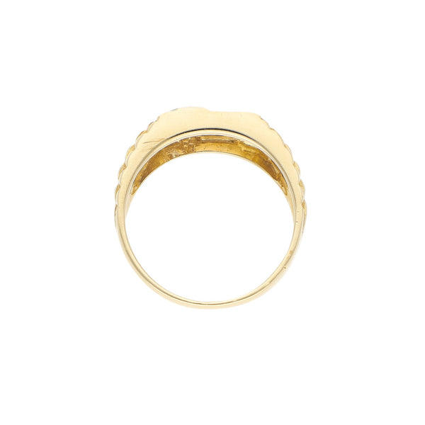 Anillo estriado con diamantes en oro amarillo 14 kilates.