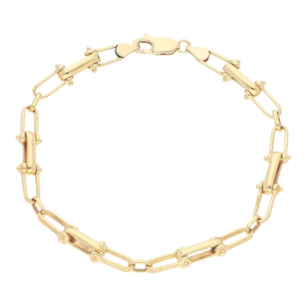 Pulsera eslabón combinado en oro amarillo 14 kilates.