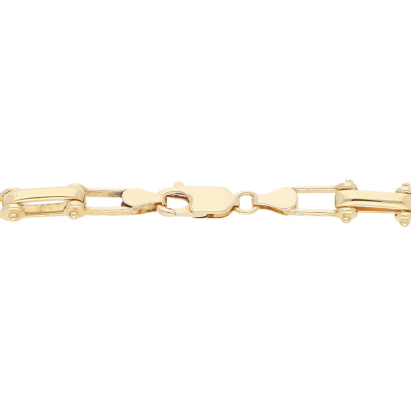 Pulsera eslabón combinado en oro amarillo 14 kilates.