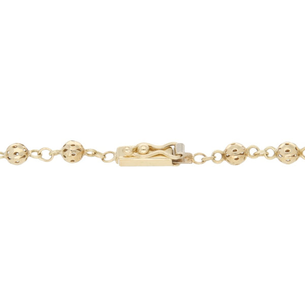 Pulsera tipo rosario eslabón calado en oro amarillo 14 kilates.
