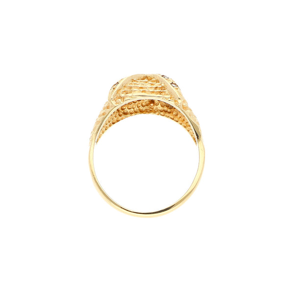 Anillo diseño especial motivo búho con Rubíes y circonias en oro amarillo 14 kilates.