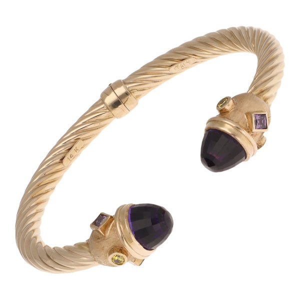 Pulsera de arillo articulada con sintéticos en oro amarillo 14 kilates.