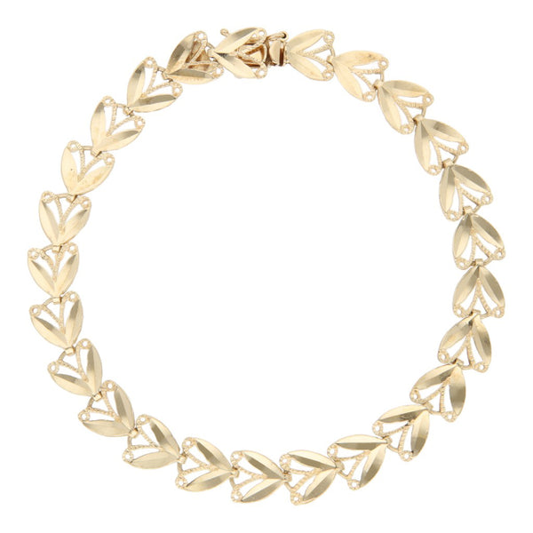 Pulsera eslabón articulado en oro amarillo 14 kilates.