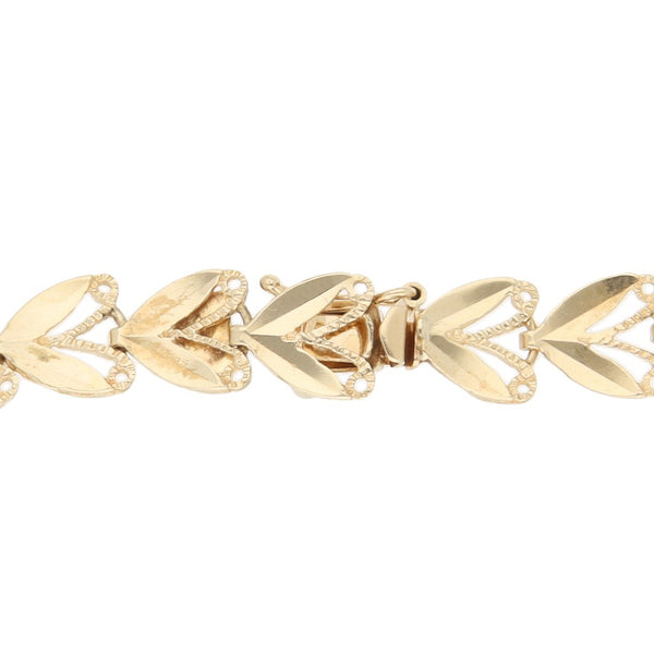 Pulsera eslabón articulado en oro amarillo 14 kilates.