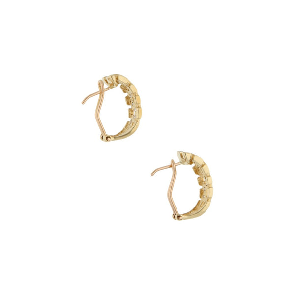 Aretes calados con circonias en oro amarillo 14 kilates.