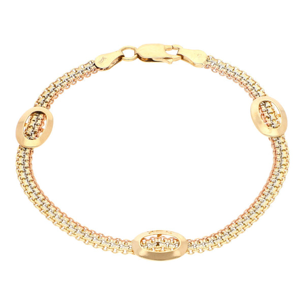 Pulsera eslabón tejido con aplicaciones motivo óvalo en oro tres tonos 14 kilates.