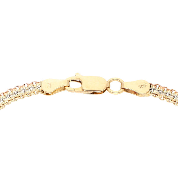 Pulsera eslabón tejido con aplicaciones motivo óvalo en oro tres tonos 14 kilates.
