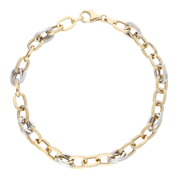 Pulsera eslabón cruzado en oro dos tonos 14 kilates.