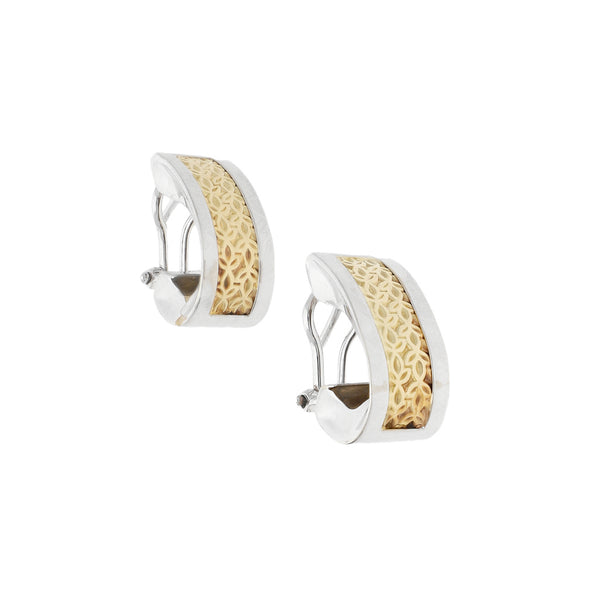 Aretes diseño especial en oro blanco 14 kilates.