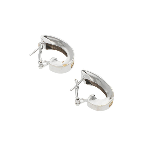 Aretes diseño especial en oro blanco 14 kilates.
