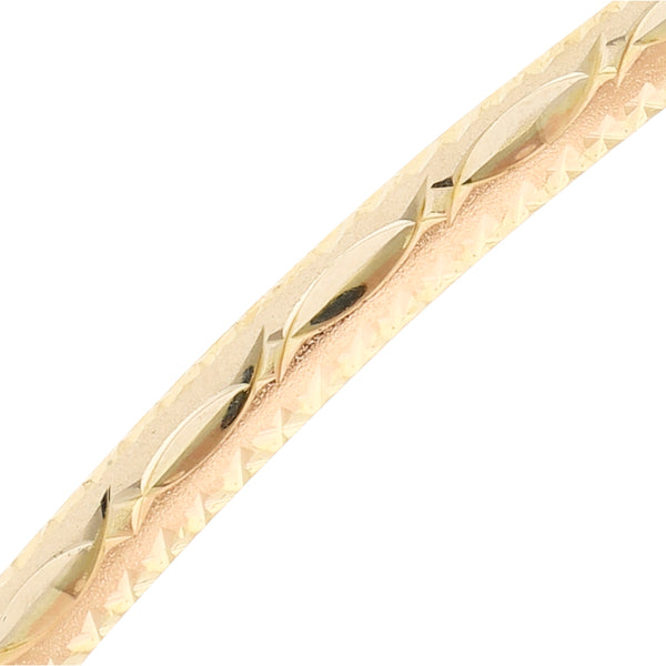 Dos pulseras de arillo labradas en oro amarillo 14 kilates.