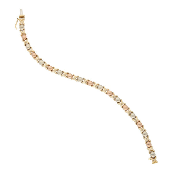 Pulsera eslabón XOXO en oro tres tonos 14 kilates.