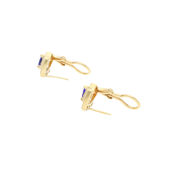 Aretes diseño especial con diamantes y sintéticos en oro amarillo 14 kilates.