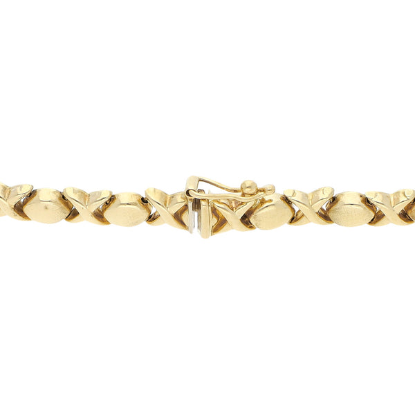 Pulsera eslabón XOXO en oro amarillo 14 kilates.