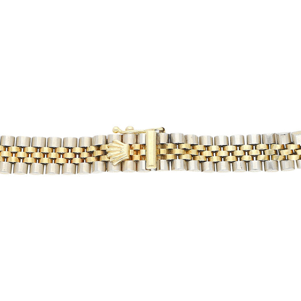 Pulsera eslabón articulado en oro dos tonos 14 kilates.