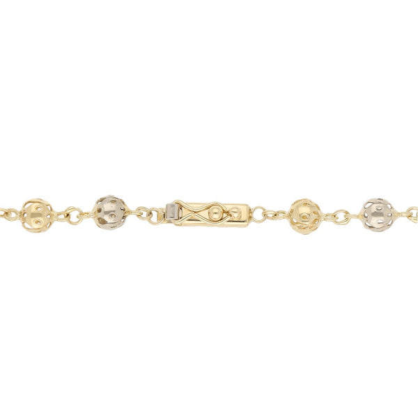 Pulsera eslabón boleado en oro tres tonos 14 kilates.