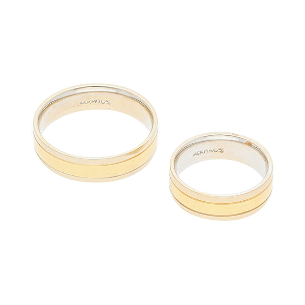 Dos argollas diseño especial en oro dos tonos 14 kilates.