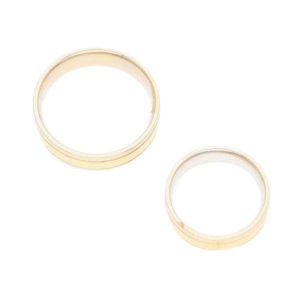 Dos argollas diseño especial en oro dos tonos 14 kilates.