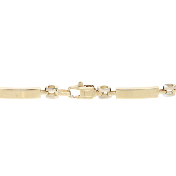 Pulsera eslabón articulado en oro dos tonos 14 kilates.