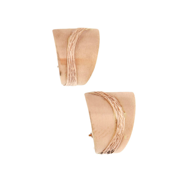 Aretes labrados en oro rosa 14 kilates.