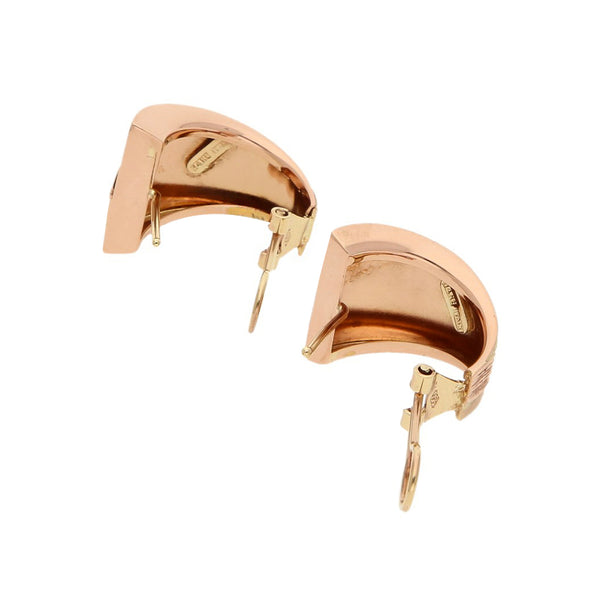Aretes labrados en oro rosa 14 kilates.