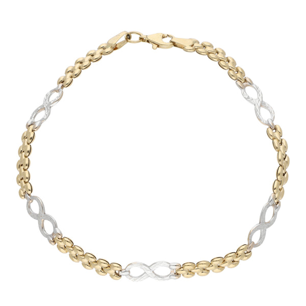 Pulsera eslabón articulado con aplicaciones motivo infinito en oro dos tonos 14 kilates.