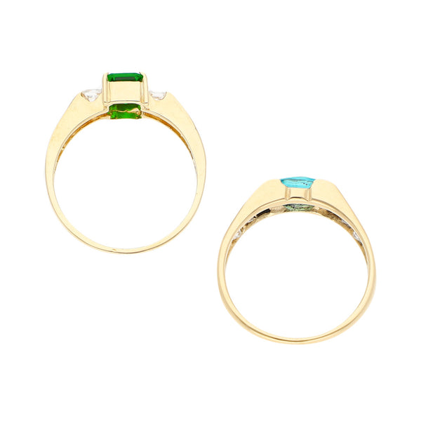 Dos anillos diseño especial con sintéticos en oro amarillo 14 kilates.