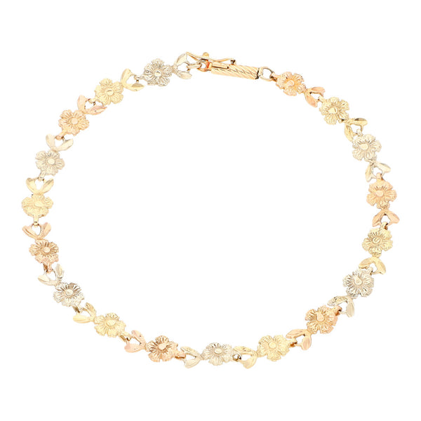 Pulsera eslabón articulado motivo flor en oro tres tonos 14 kilates.