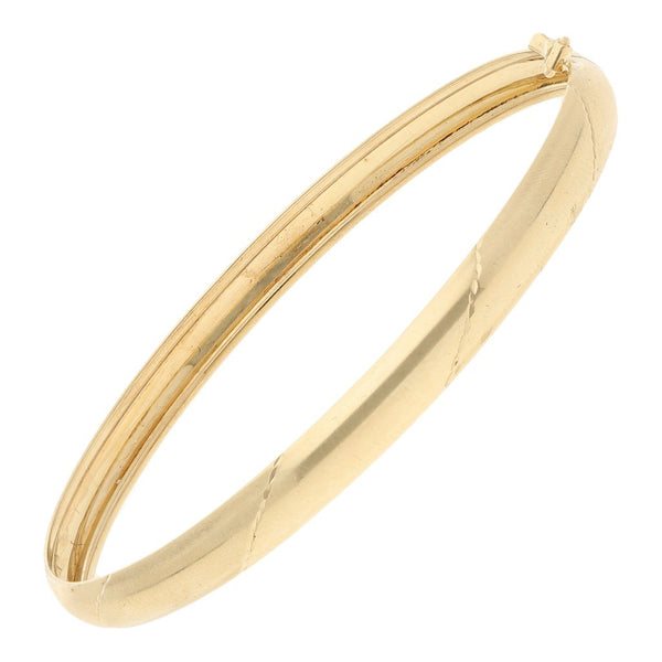 Pulsera de arillo facetada en oro amarillo 14 kilates.