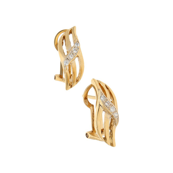 Aretes diseño especial con circonias en oro amarillo 14 kilates.