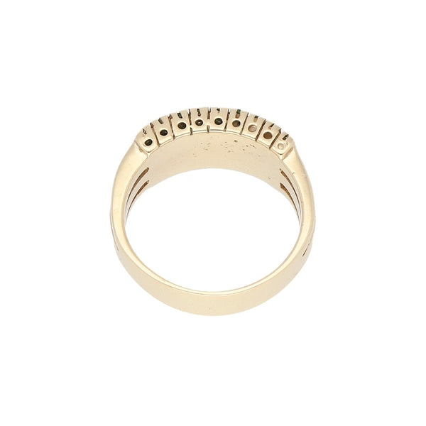 Anillo diseño especial con sintéticos en oro amarillo 14 kilates.