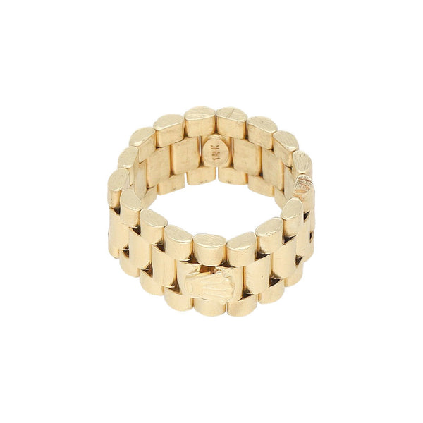 Argolla articulada con aplicación motivo corona en oro amarillo 14 kilates.