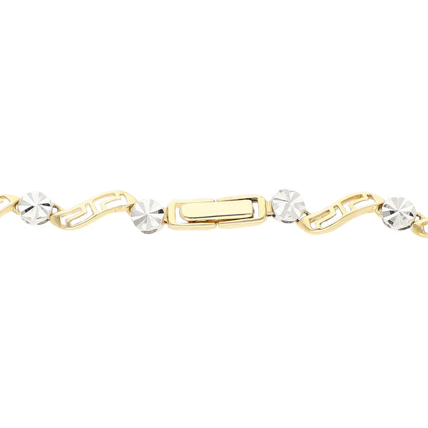 Pulsera eslabón articulado en oro dos tonos 14 kilates.