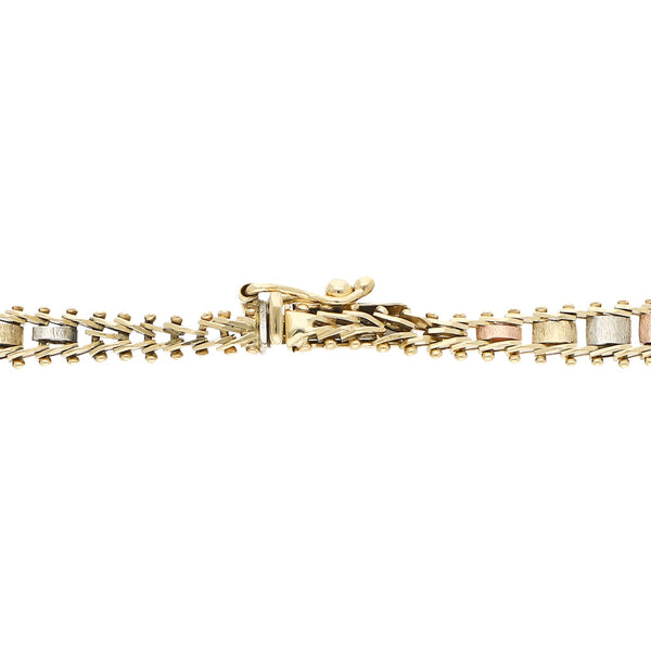 Pulsera eslabón boleado en oro tres tonos 14 kilates.