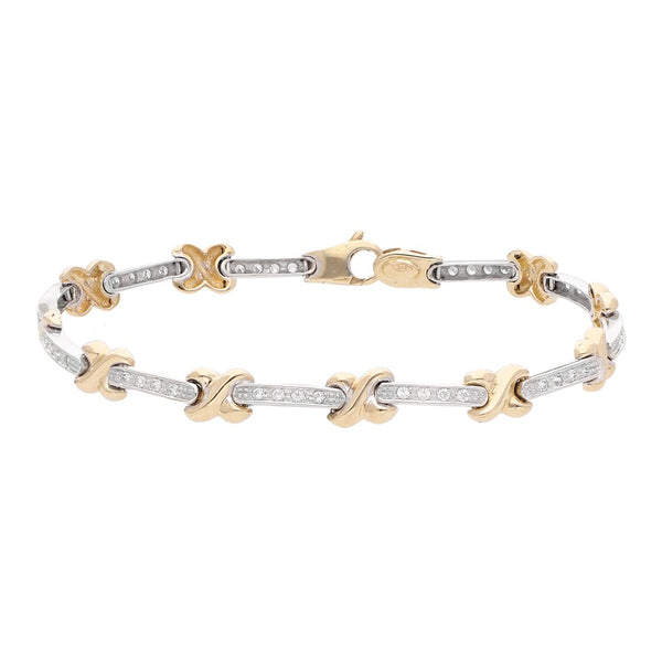 Pulsera eslabón articulado con circonias en oro dos tonos 14 kilates.