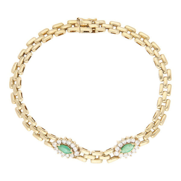 Pulsera eslabón articulado motivo flor con esmeraldas y circonias en oro amarillo 14 kilates.