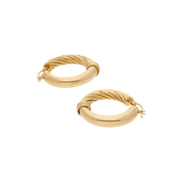Arracadas huecas en oro amarillo 14 kilates.